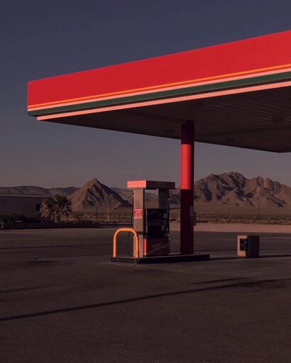 Empty gas station during a sunset